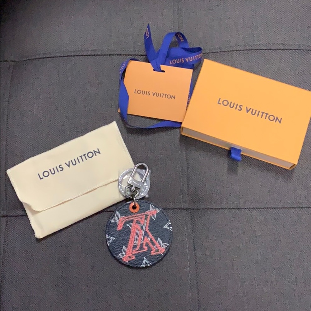 Authentic Louis Vuitton upside down bag charm